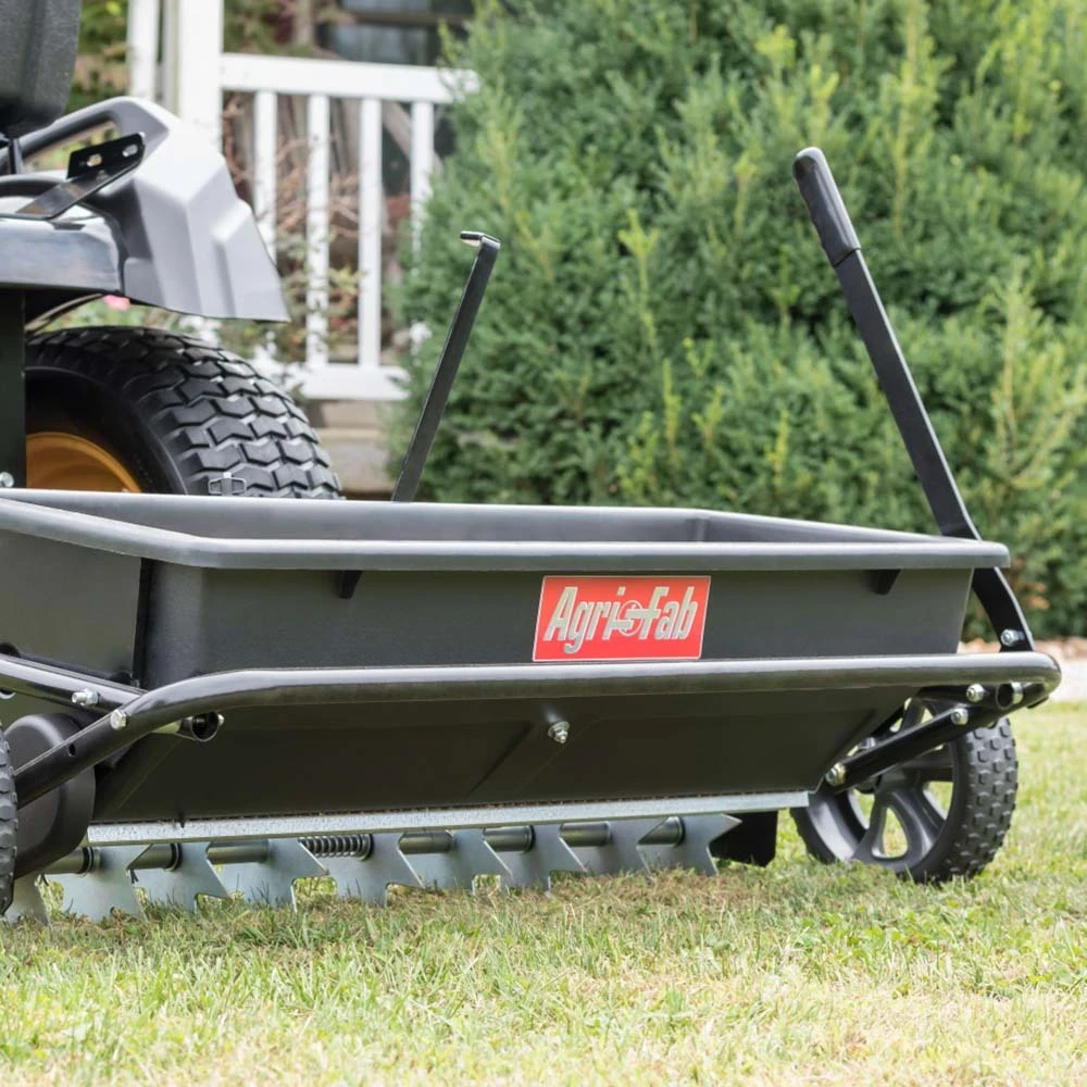 Agri-Fab 100 Lb. Tow Behind Poly Drop Spreader/Spike Aerator, 32 In. 2 Agri-Fab 100 Lb. Tow Behind Poly Drop Spreader/Spike Aerator, 32 In. - Image 2